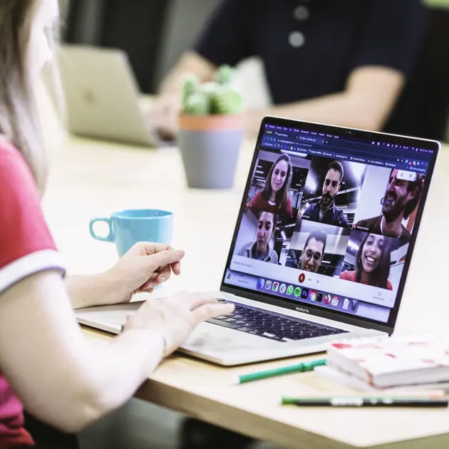 2129 Woman With Laptop In Online Meeting Courtesy Bridge Of Billions