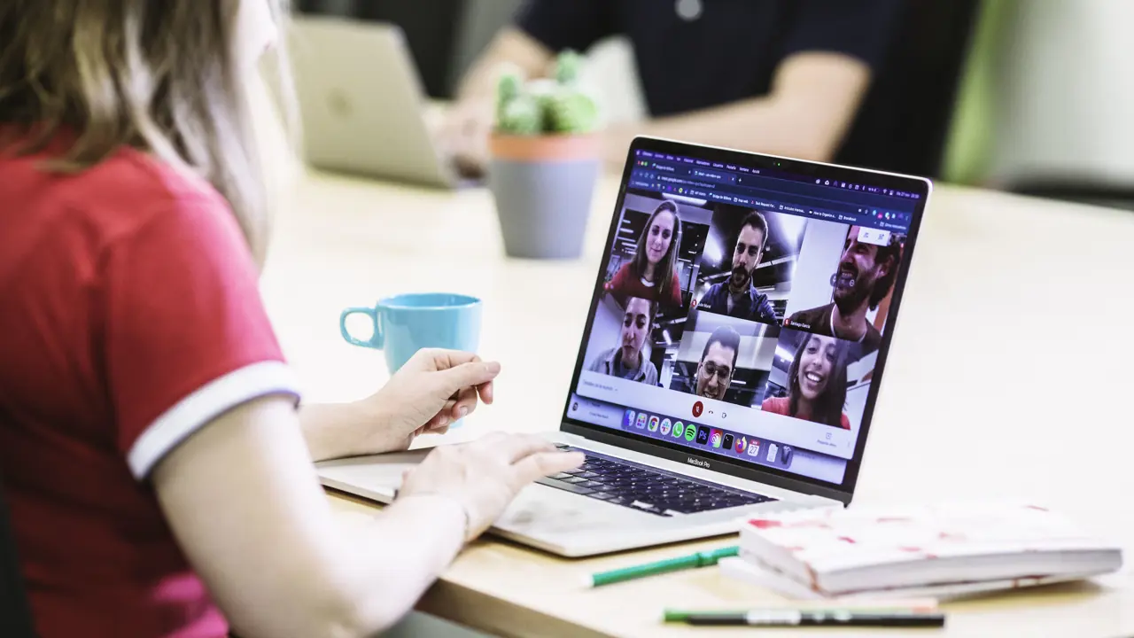 2129 Woman With Laptop In Online Meeting Courtesy Bridge Of Billions