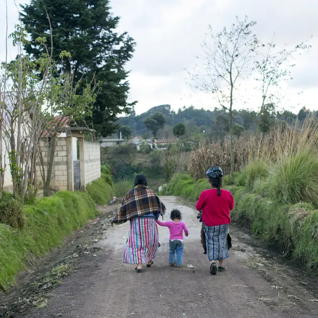 2123 Woman Walking In Guatemalan Village Copyright Stuart Freedman