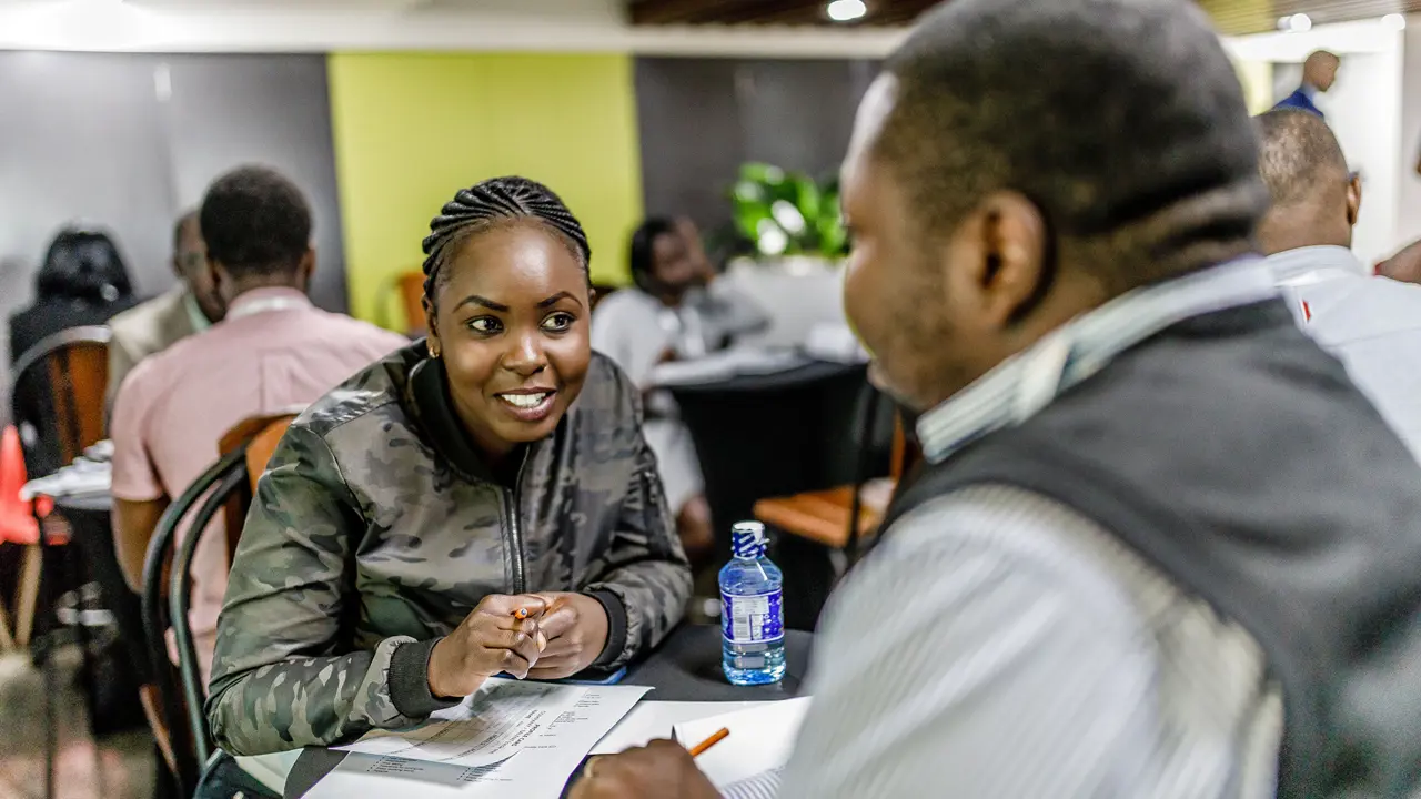 2112 Woman Interviewing Man Aatc Village Capital Nairobi Copyright Bryan Jaybee Brian Otieno
