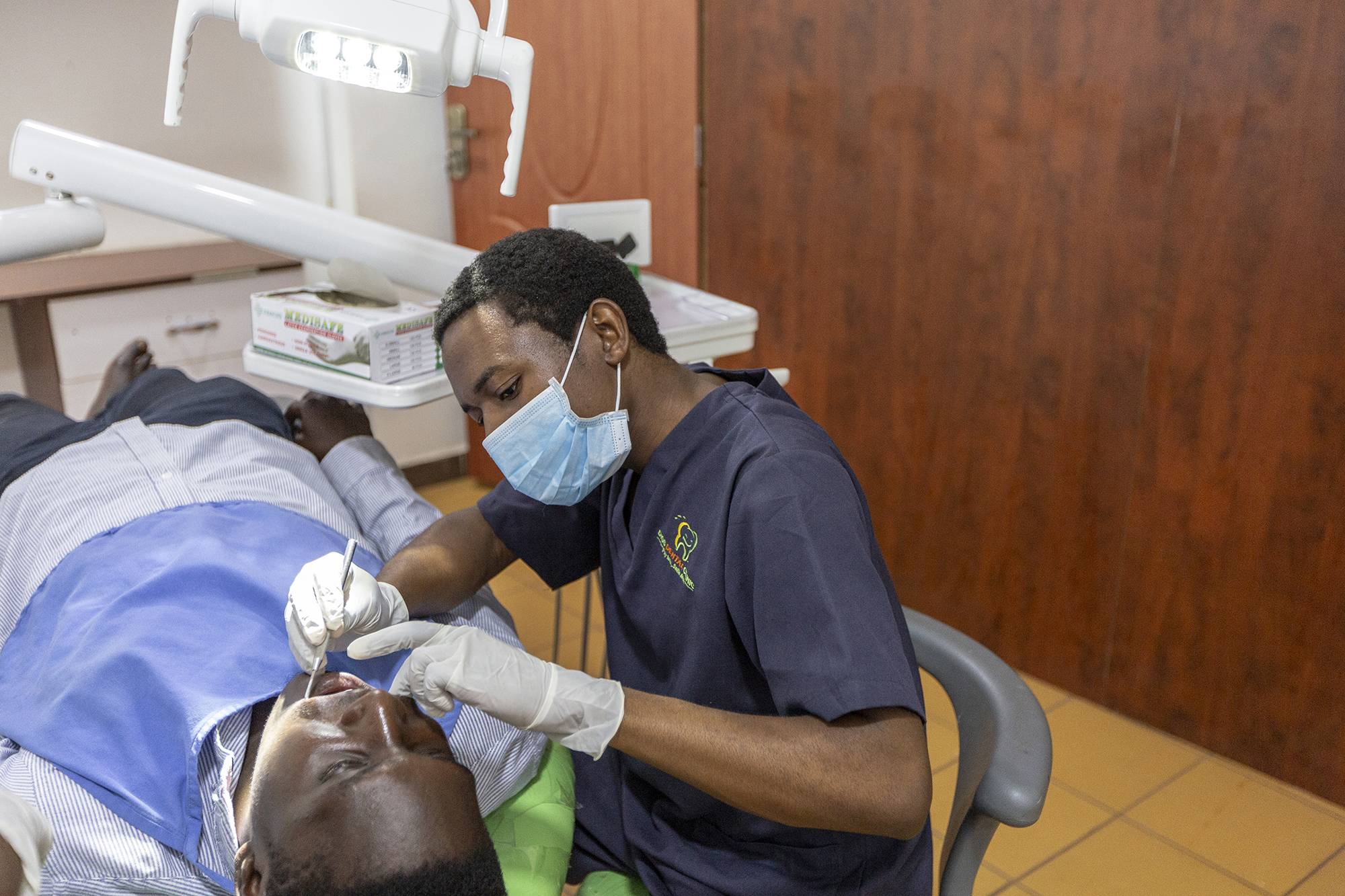 2128 Dentist Checking Patient Unreasonable Dios Dental Copyright Stuart Freedman