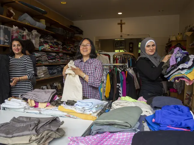Women organising a Clothes Donation Shop