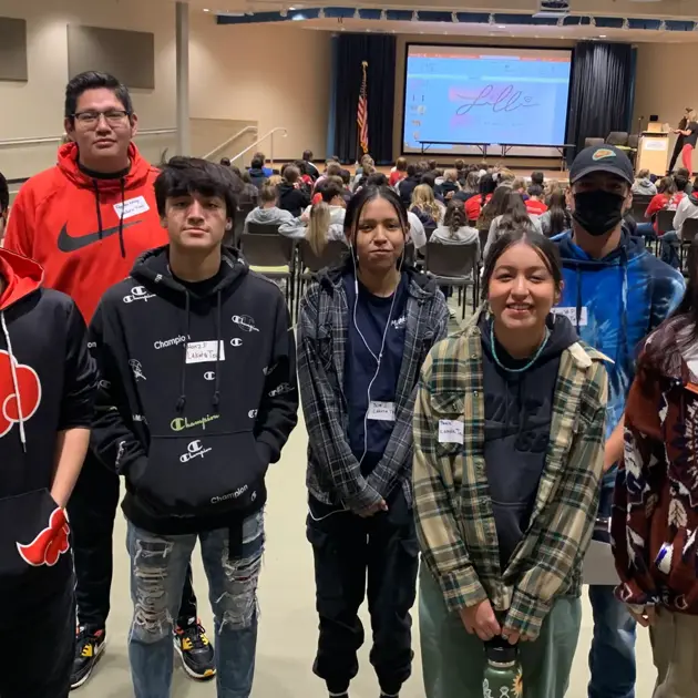 Group of teenagers in conference room