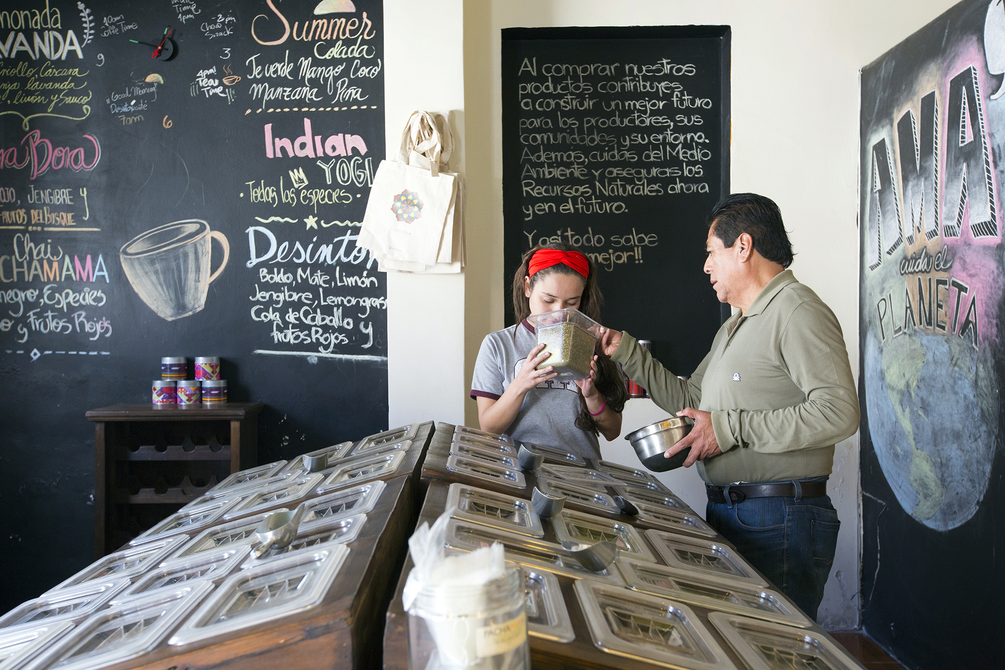 31 Father Letting Girl Smell Tea Technoserve Pachamama Copyright Stuart Freedman