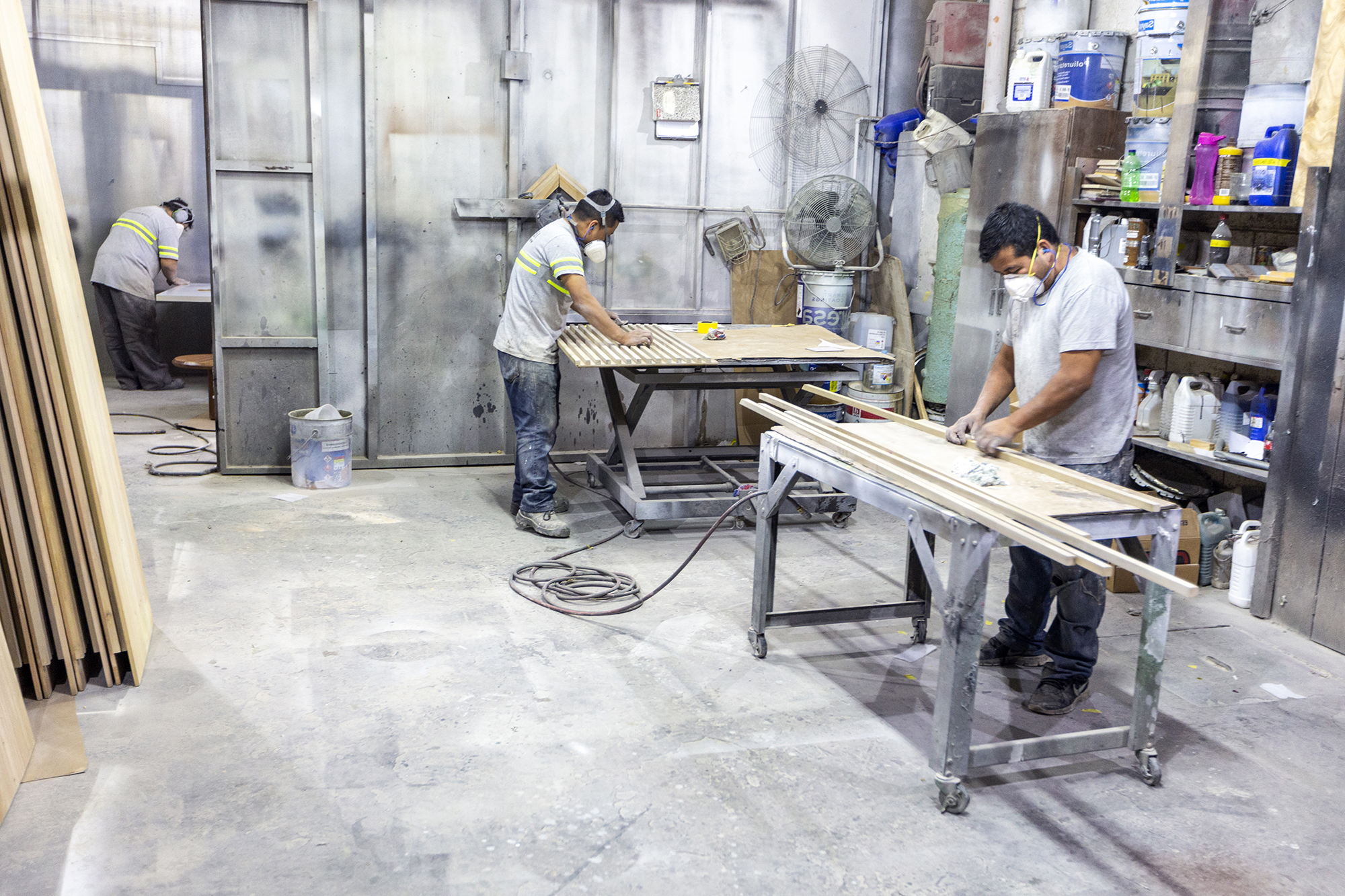2111 Three Men In Wood Workshop Labrica Bpeace Copyright Stuart Freedman