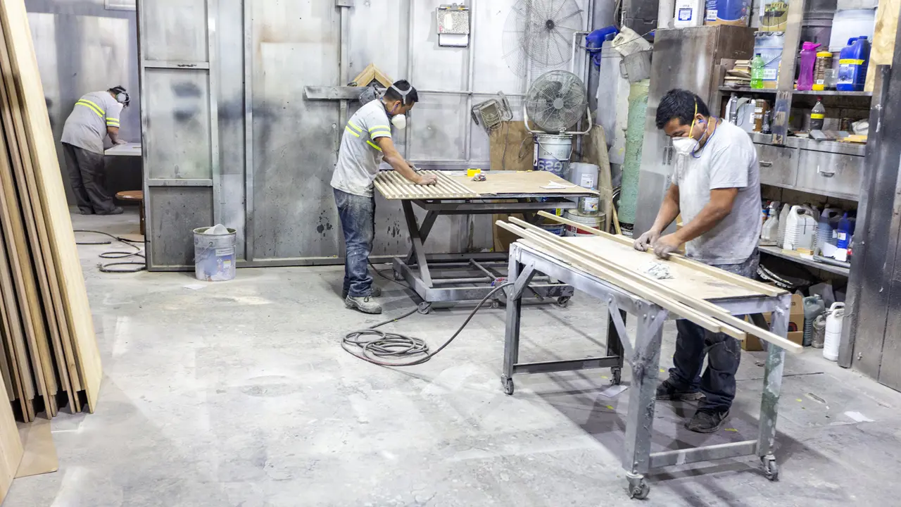 2111 Three Men In Wood Workshop Labrica Bpeace Copyright Stuart Freedman