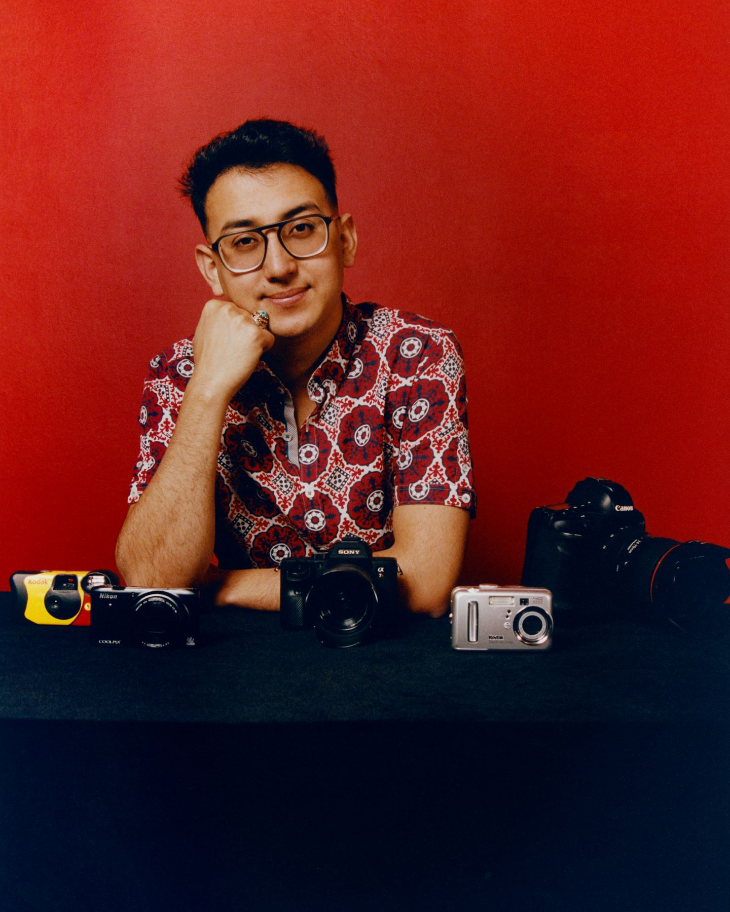 Man with camera collection Amir