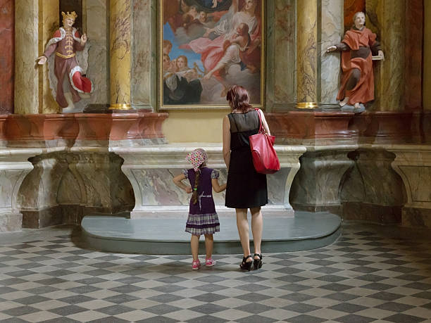 Mother holding little girls hand