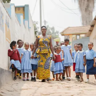 Teacher and students New Light Junior Nursery 2023