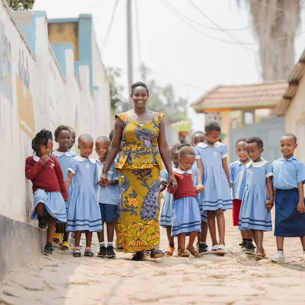 Teacher and students New Light Junior Nursery 2023