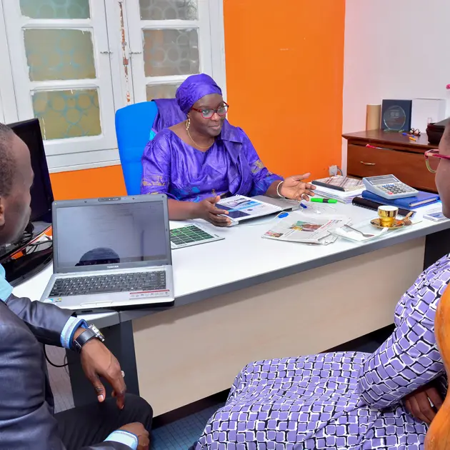 2114 Two Women And A Man In Meeting Courtesy Enablis