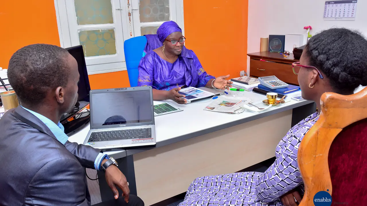 2114 Two Women And A Man In Meeting Courtesy Enablis