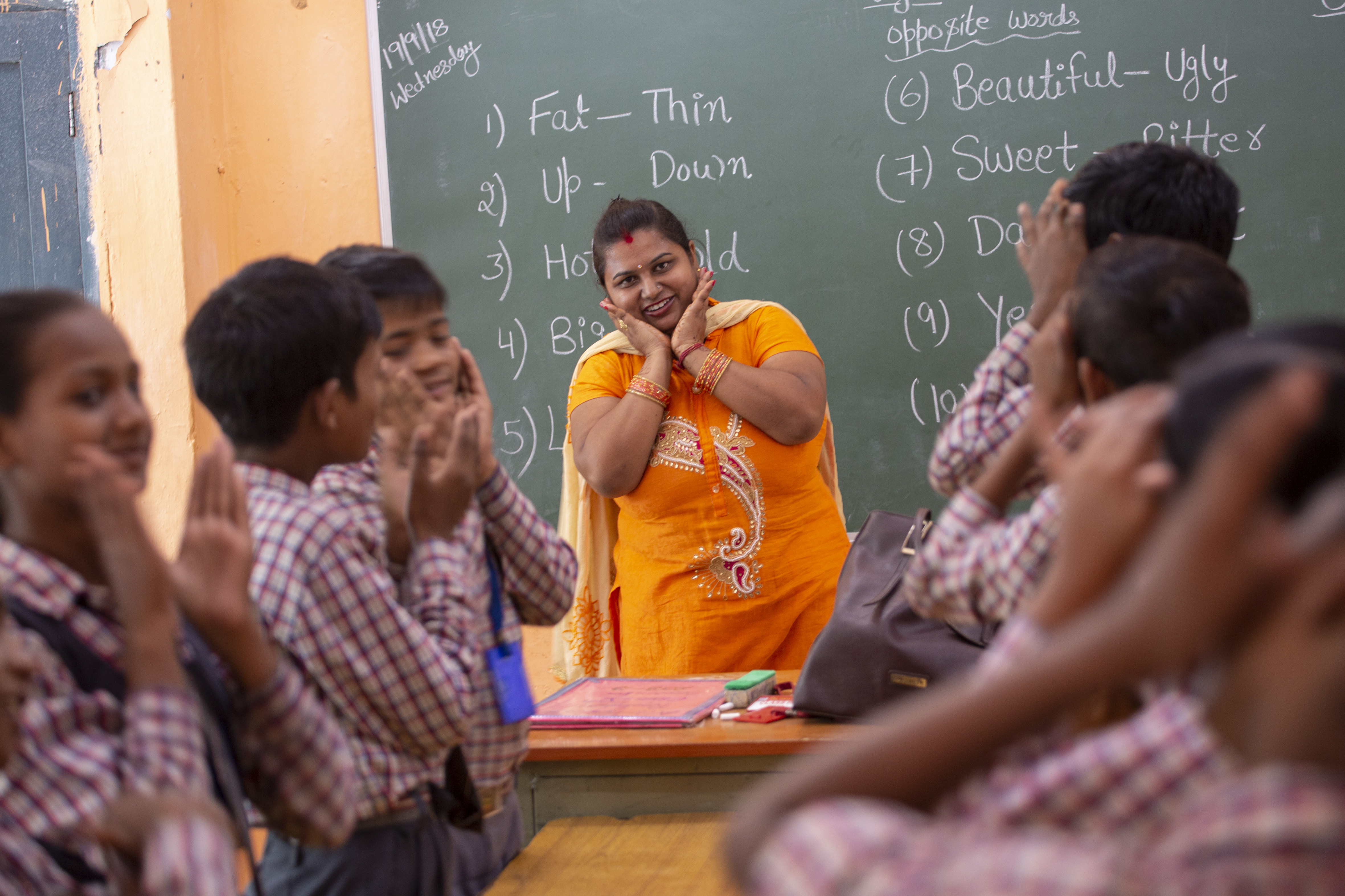 Teacher and students in a classroom