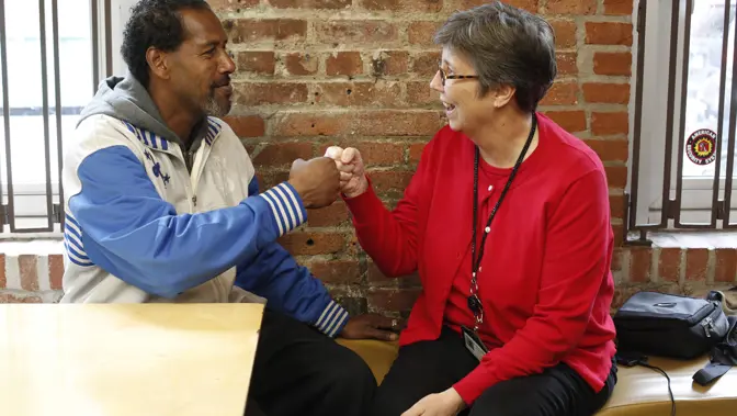 CAREERS Fist Bump St John Bread And Life Copyright Stuart Freedman