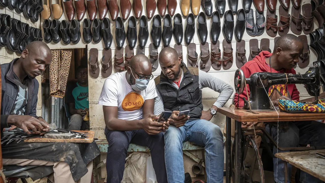 2134 Five Men In Shoe Shop Somo Copyright Sven Torfinn Panos